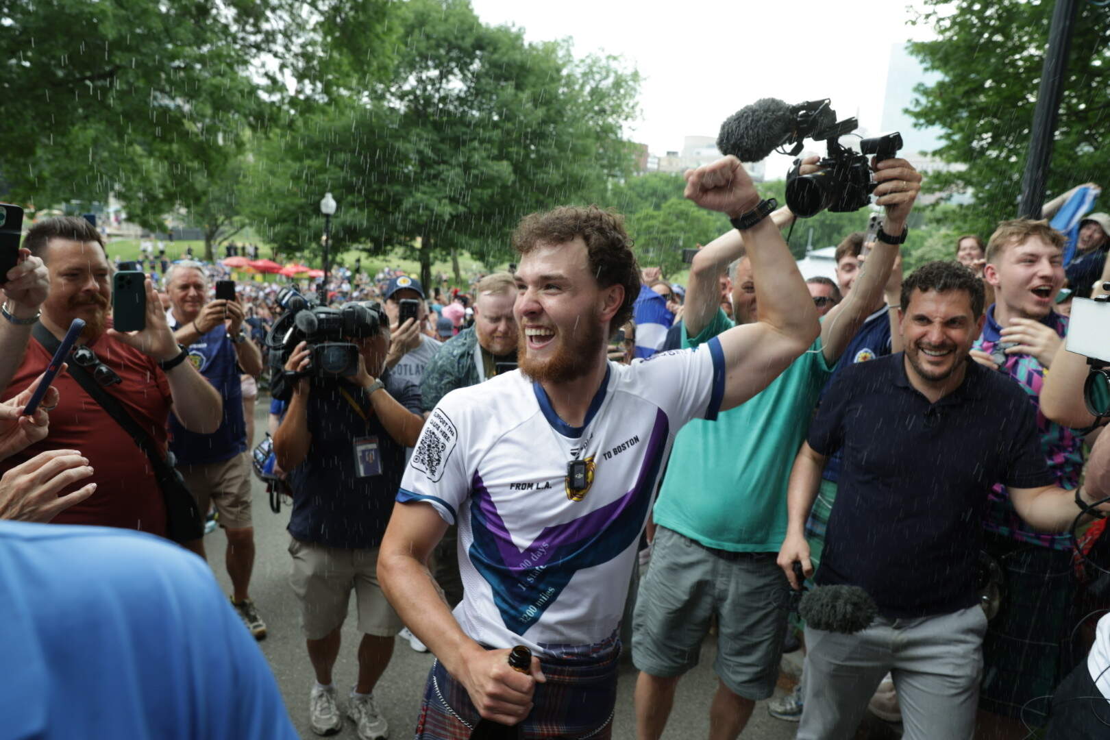 Scottish soccer fan Craig Ferguson arrives in Boston after walking across the country to see Scotland play in the World Cup on Saturday. (Robin Lubbock/WBUR)