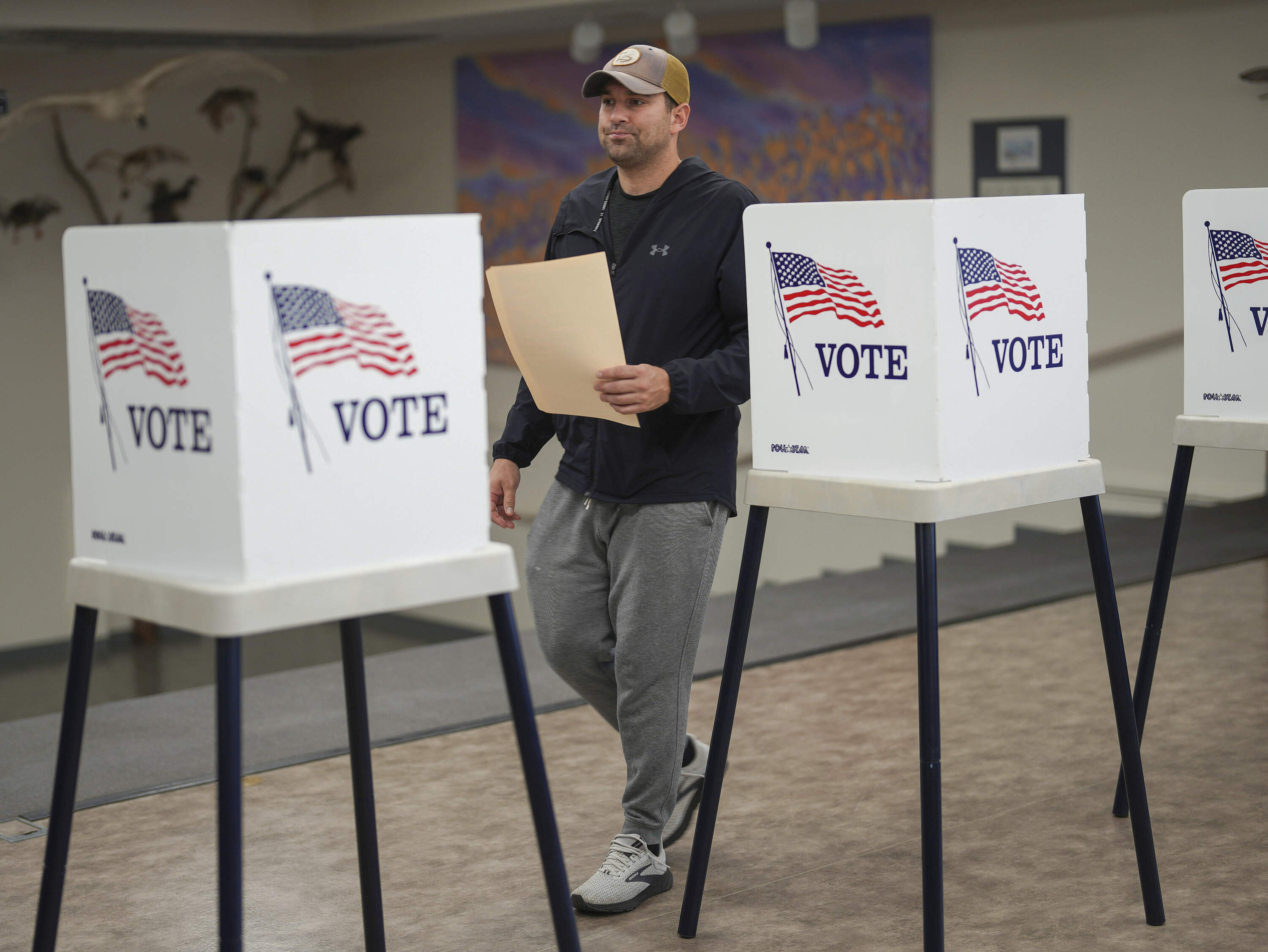 Alexander Johnson of Ames, Iowa, completes his ballot on Election Day, Tuesday, Nov. 5, 2024, at the McFarland Lake Park Conservation Center polling place in Ames. (Bryon Houlgrave/AP)