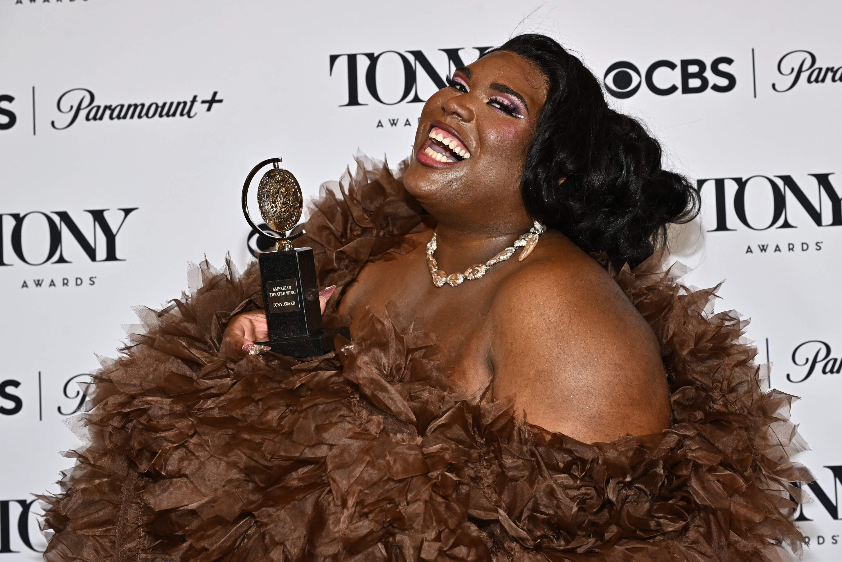 Qween Jean poses in the press room with the award for best costume design of a musical for "Cats: The Jellicle Ball" during the 79th Tony Awards on Sunday, June 7, 2026, at Radio City Music Hall in New York. (Evan Agostini/Invision/AP)