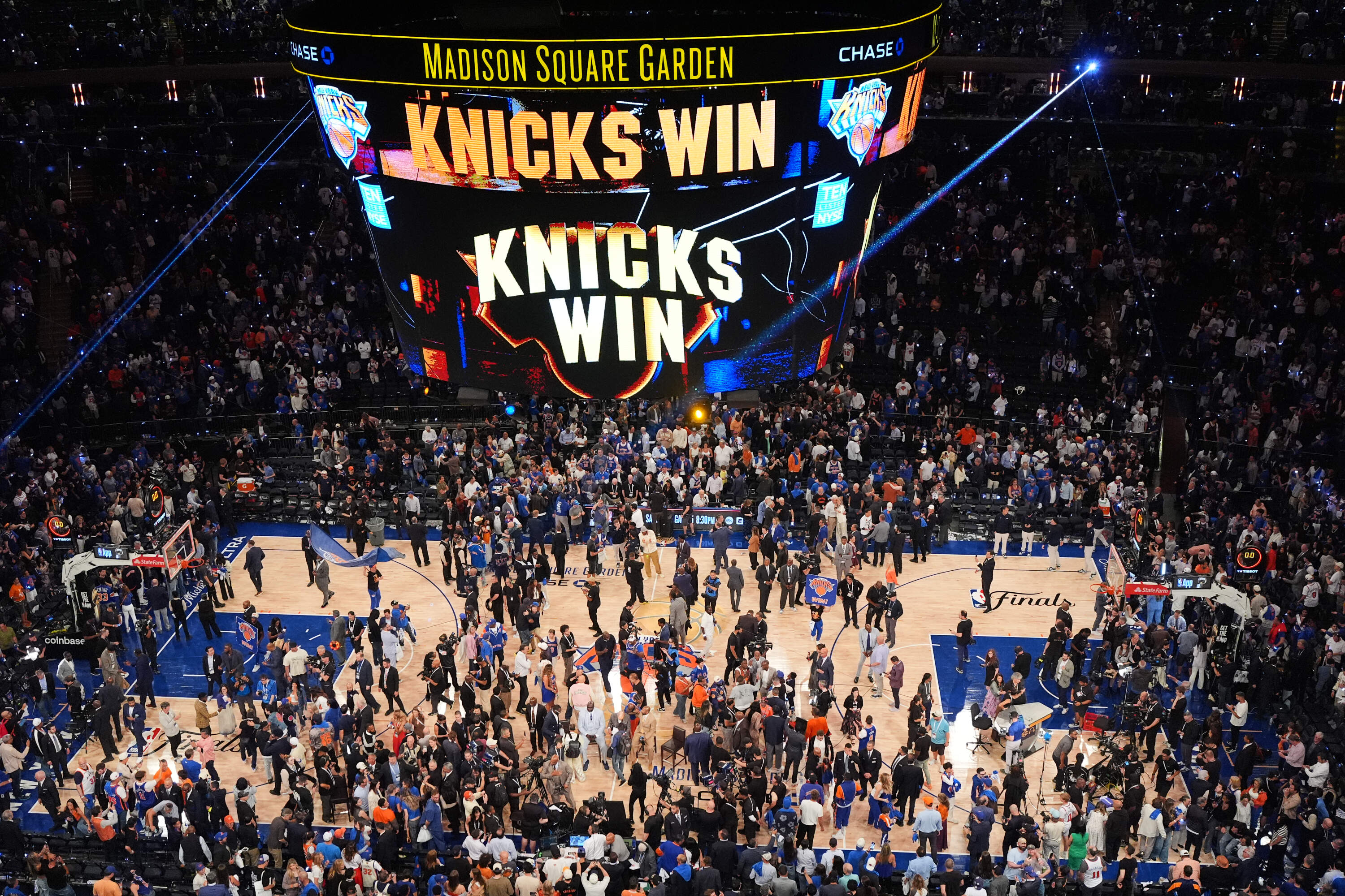 Players and fans celebrate after the New York Knicks' victory over the San Antonio Spurs in Game 4 of the NBA Finals basketball series, Wednesday, June 10, 2026, in New York. (Frank Franklin II/AP)