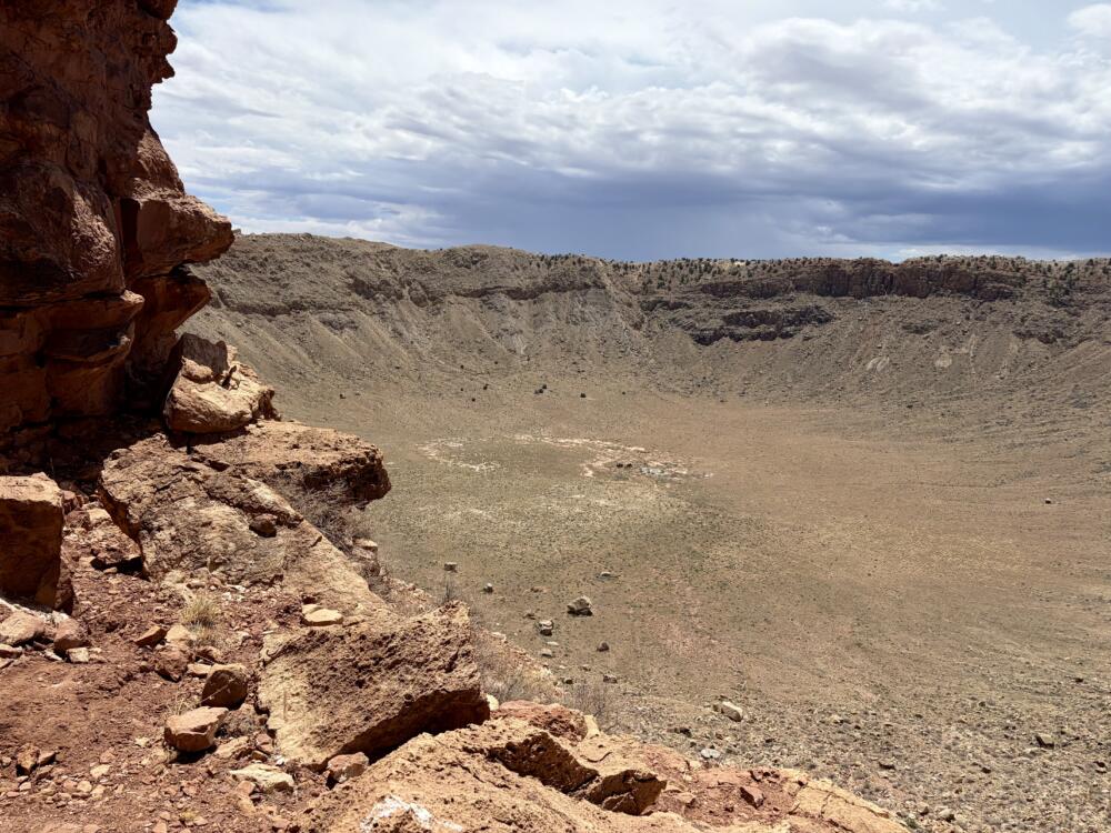 A view from the trail that leads to the bottom of the crater in Northern Arizona. The meteorite that struck here was about 150-feet in diameter. (Peter O’Dowd/Here & Now)