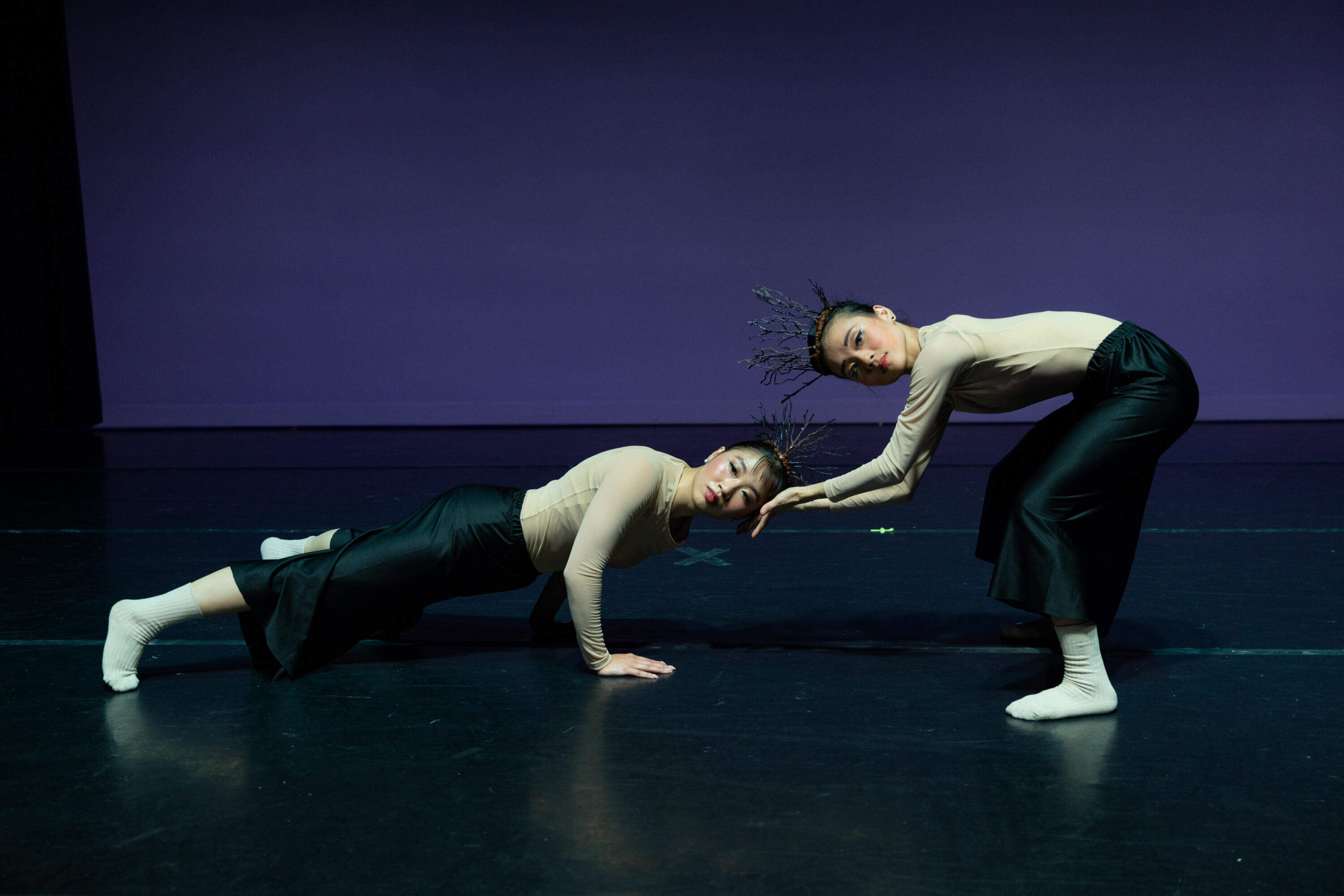 Two Asian American Ballet Project dancers in "Gabi sa Gubat/Night Jungle." (Courtesy Olivia Moon Photography)
