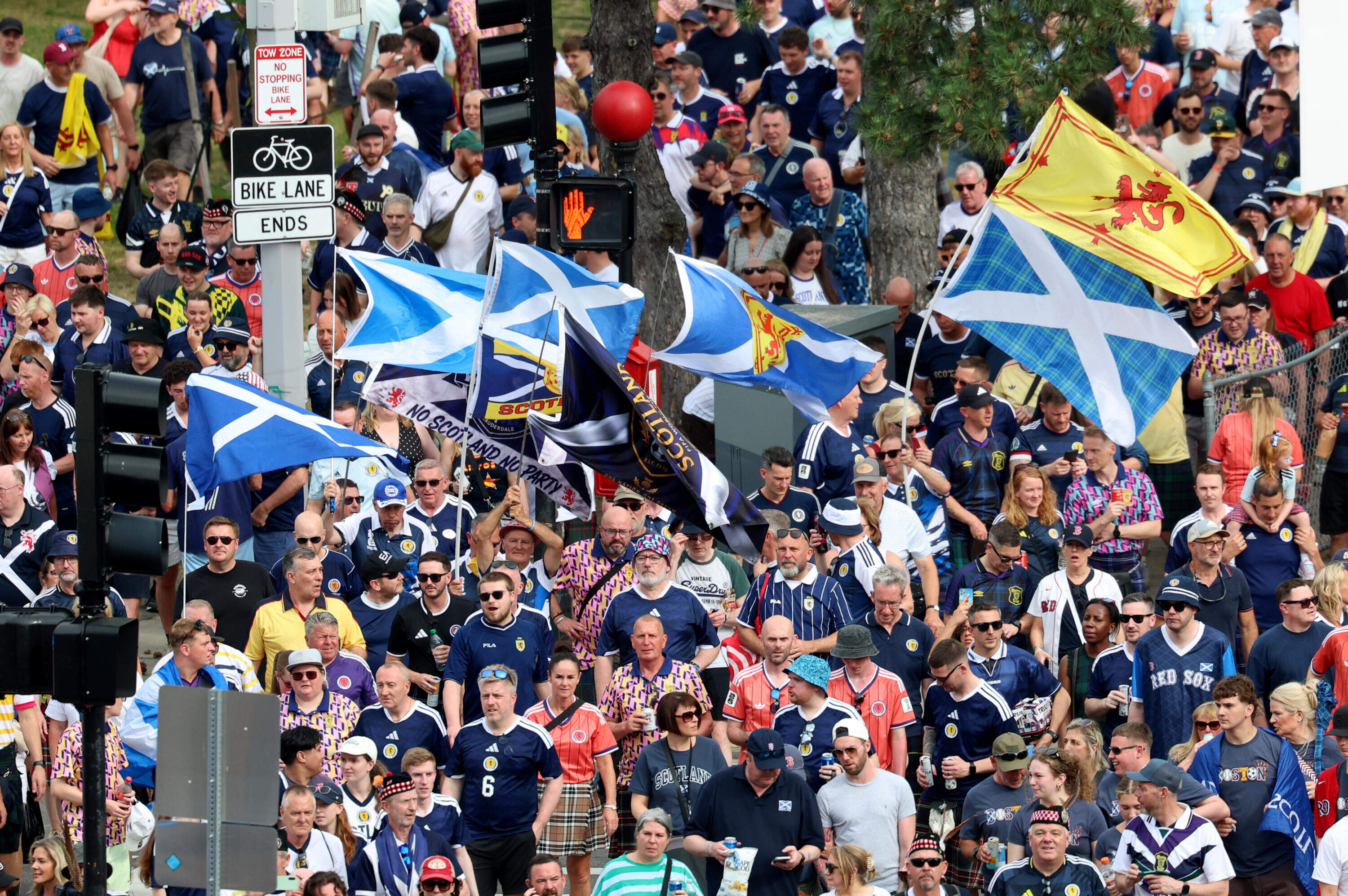 Scotland soccer fans take part in the Tartan Army March, making their way to Fenway Park ahead of Sunday's baseball game between the Boston Red Sox and the Texas Rangers. (Mark Stockwell/AP)