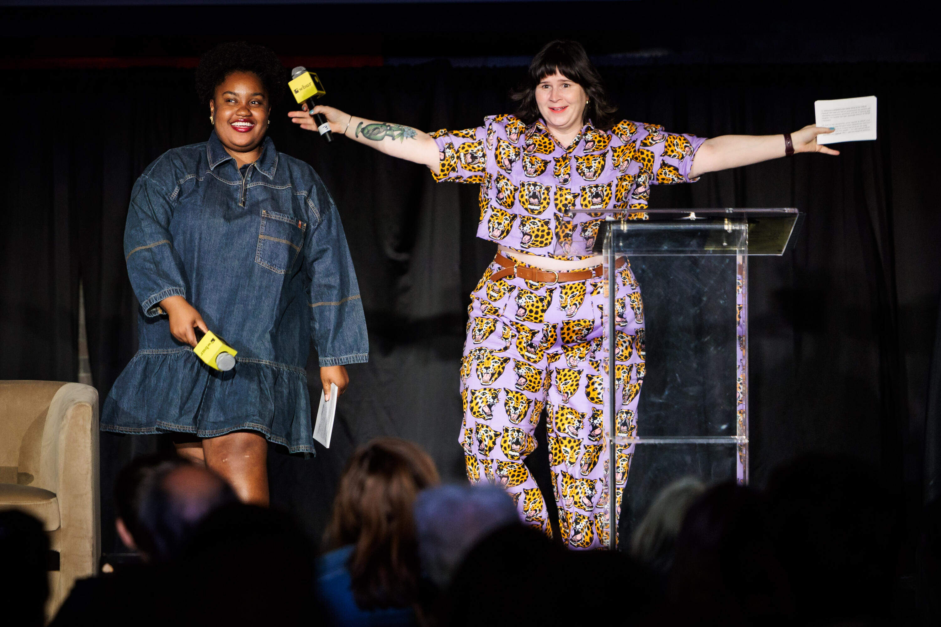 WBUR's Candice Springer, left, and WBUR's Ally Jarmanning draw laughs from the crowd during "The Game Show" at the second-annual WBUR Festival on May 29. (Nick Grace/Bolt Creative Group for WBUR)