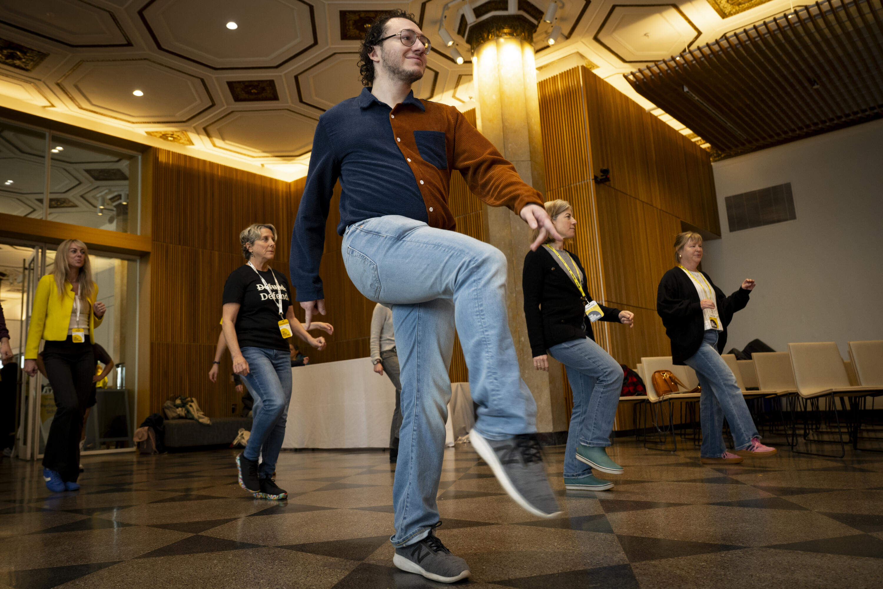 Festival attendees learn line dancing steps from instructors with the local group Line Dancing Queens on May 30. (Rachel O’Driscoll/Bolt Creative Group for WBUR)
