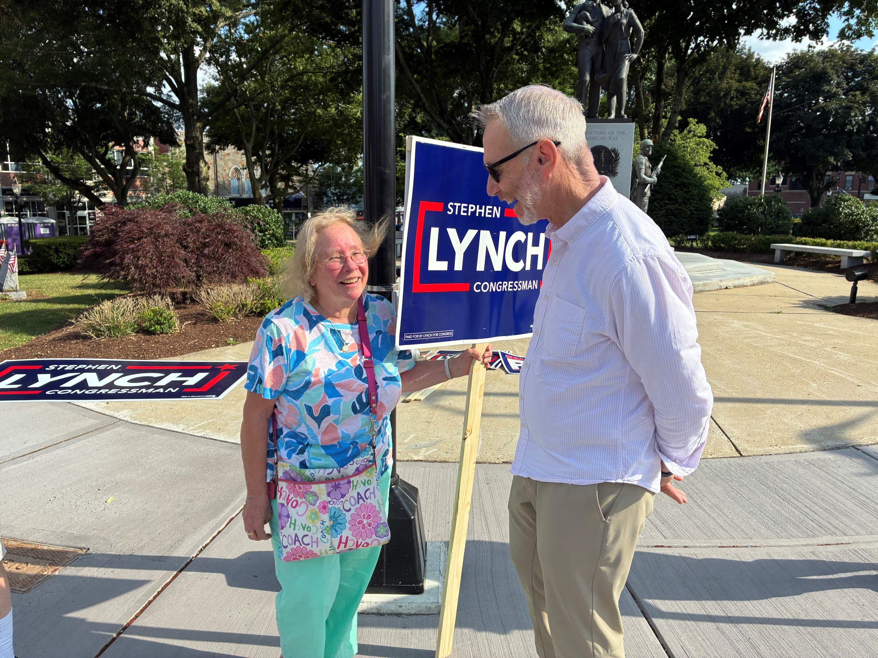 Rep. Stephen Lynch talks with supporter Mastandrea in Norwood. (Anthony Brooks/WBUR)