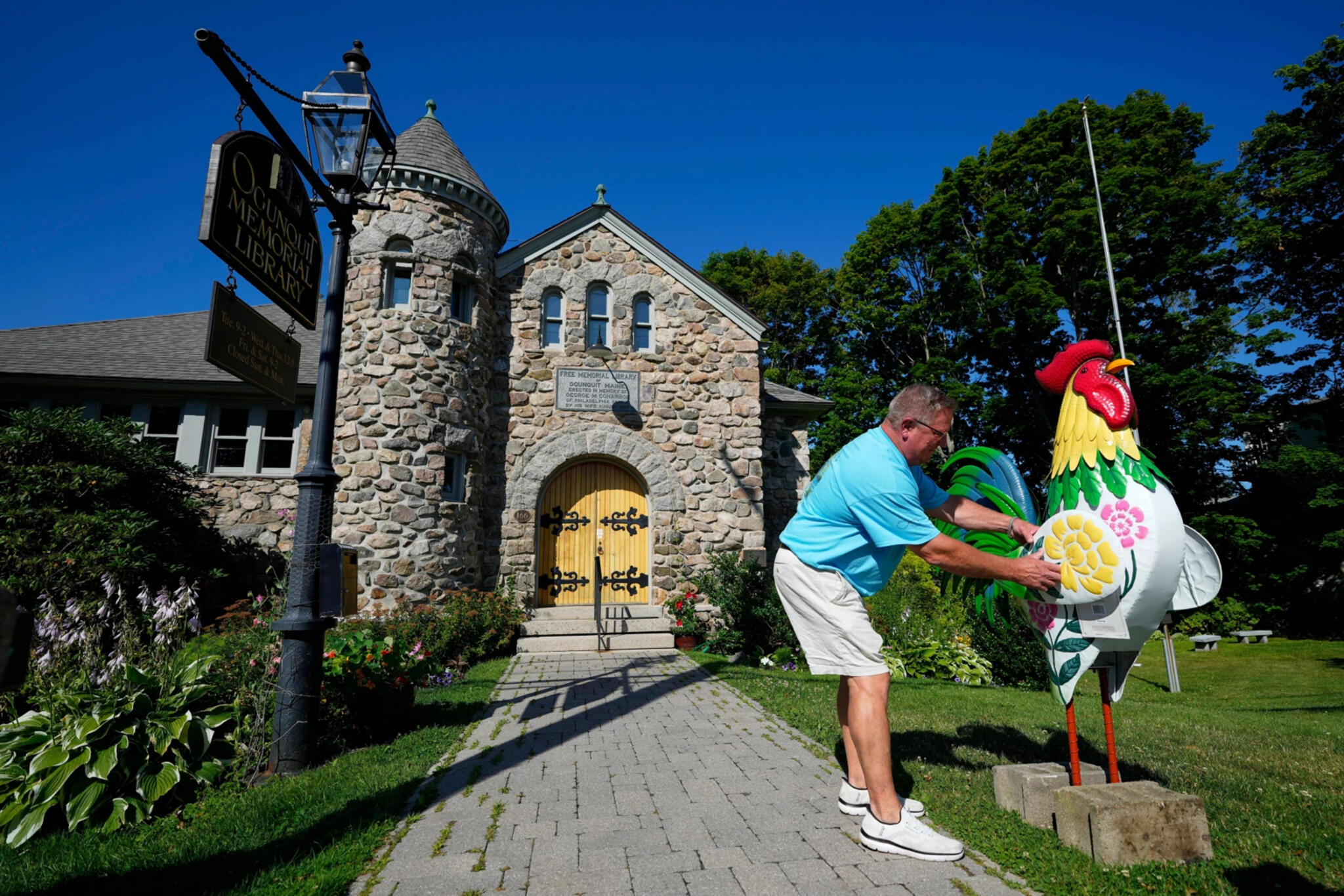 Spat over 6-foot-tall roosters in seaside Maine gets national attention