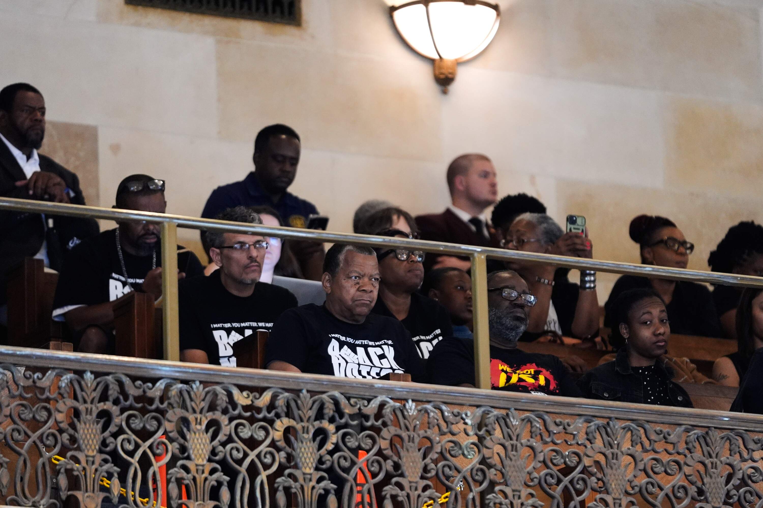 Members of the public who oppose a redistricting plan to eliminate a majority-Black congressional district in response to a U.S. Supreme Court ruling listen to House members prior to a vote on it, in Baton Rouge, La., on May 21. (Gerald Herbert/AP)