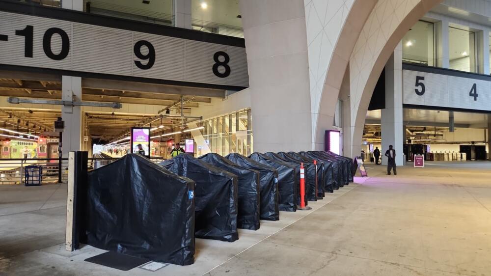 The T put fare gates outside at South Station. Some can't be used when it rains