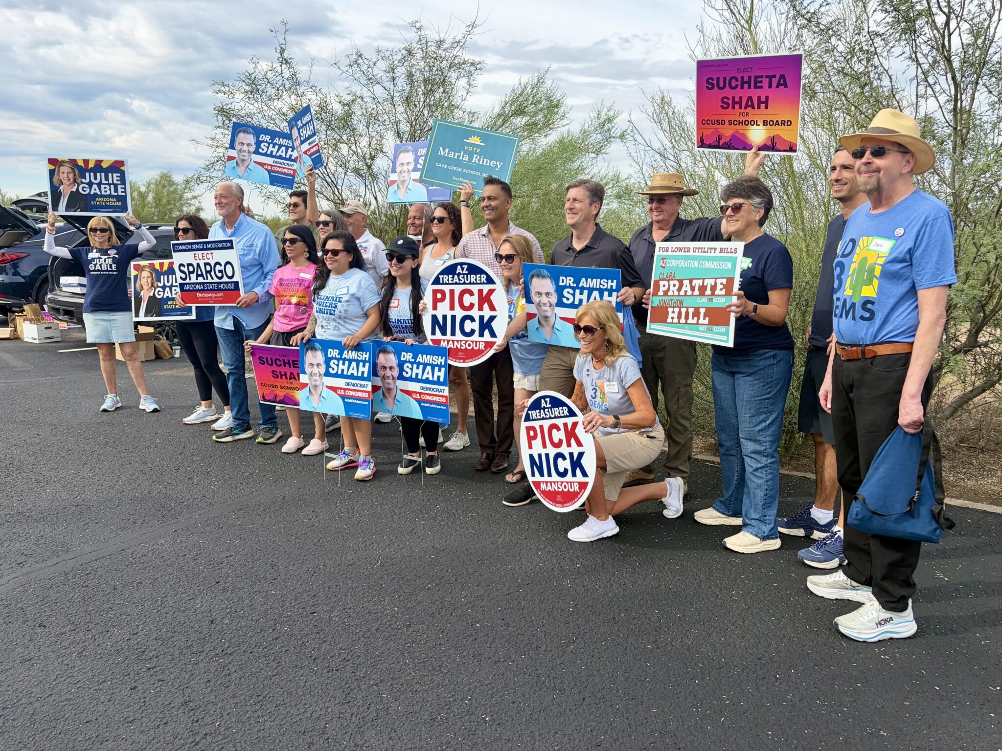 Photo: wbur.org Democrats gather in North Phoenix to canvass for candidates ahead of the 2026 midterm elections. (Peter O'Dowd/Here & Now)